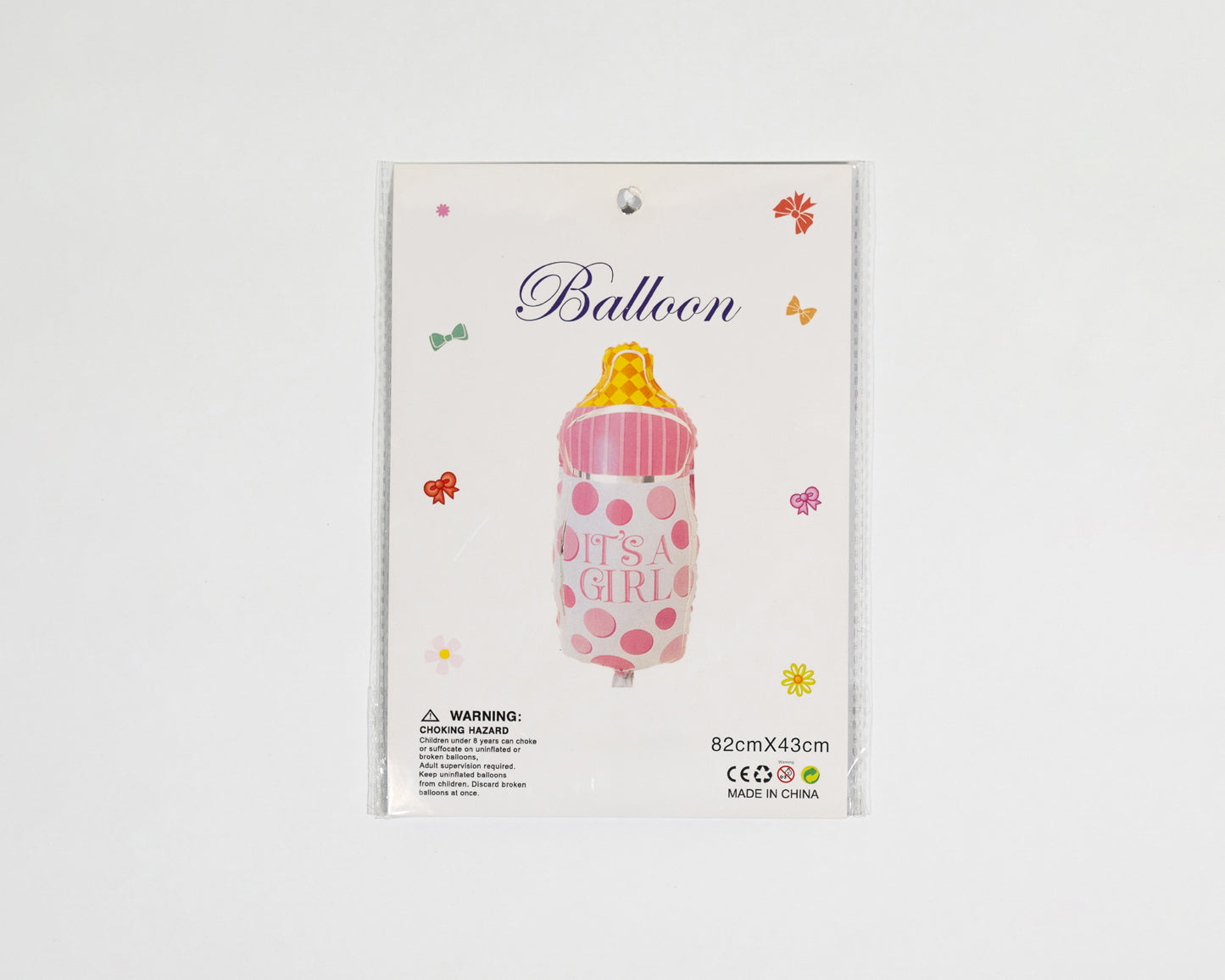 Pink baby bottle balloon welcomes a girl