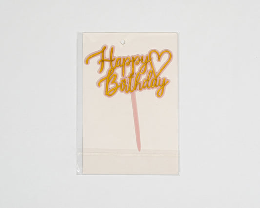 Gold heart cake topper adds elegance