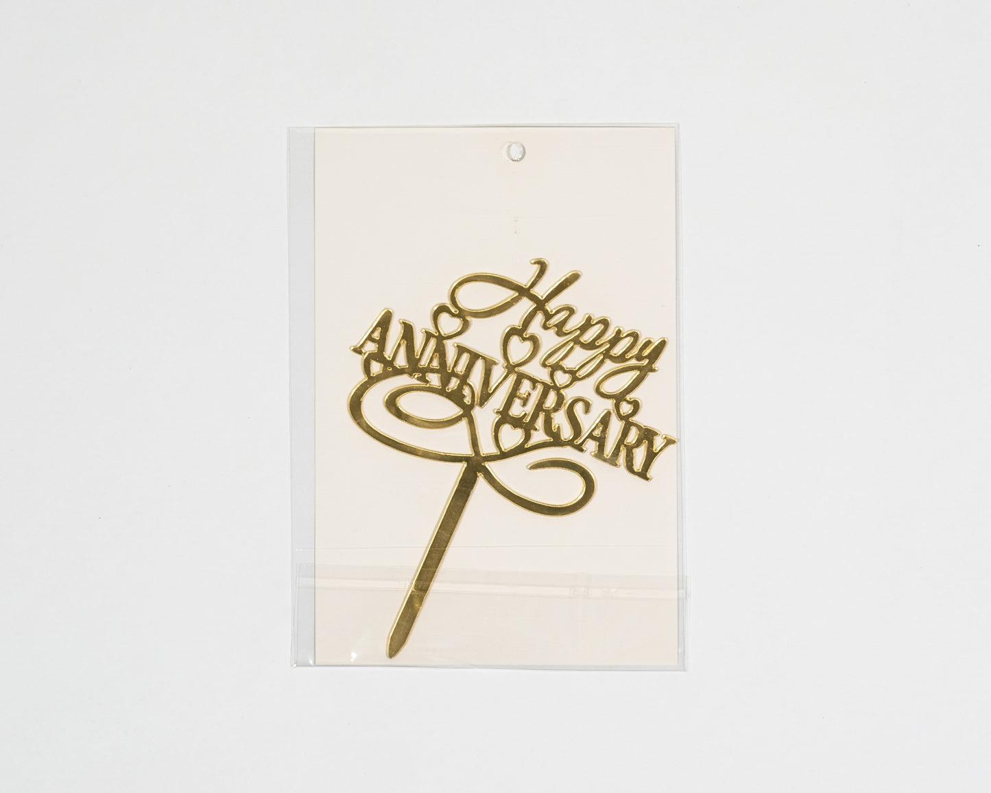 Anniversary cake topper celebrates moments