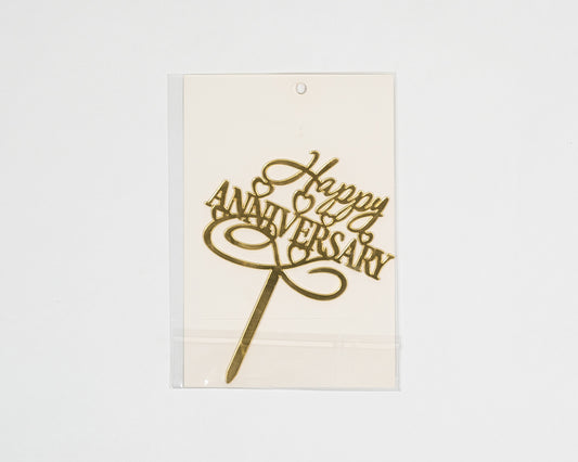 Anniversary cake topper celebrates moments