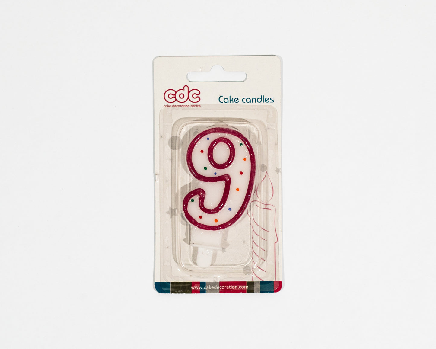 Number 9 candle adds color to the cake