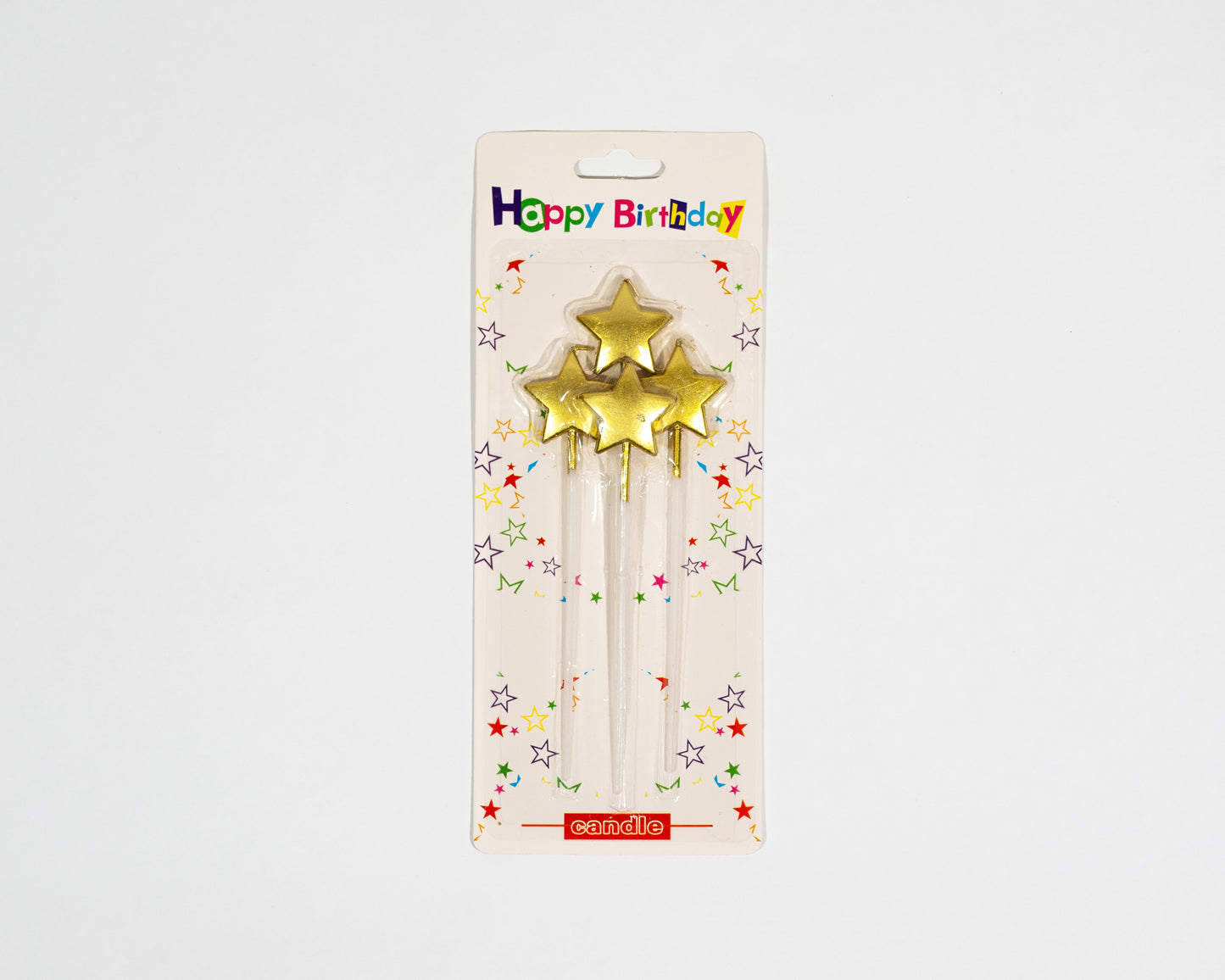 Gold star candles decorate the cake