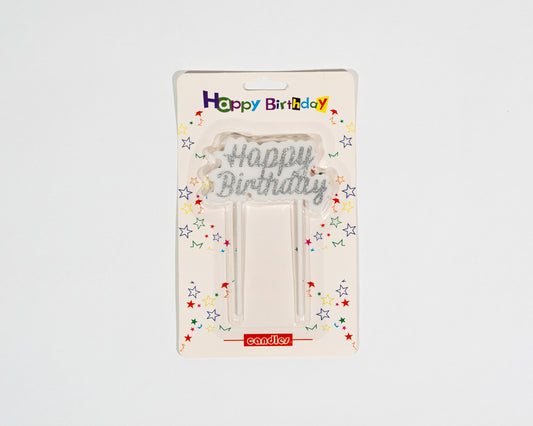 Silver Happy Birthday candle shines