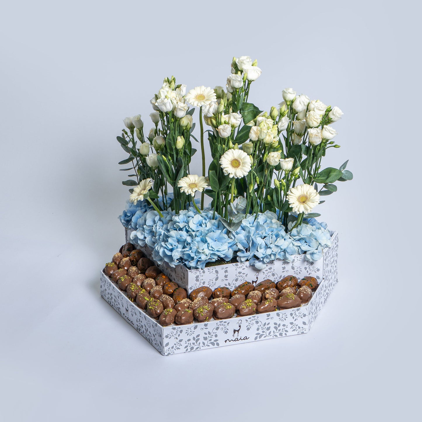 Elegante Triangle Assorted Chocolate Dates Box with Blue Hydrangea